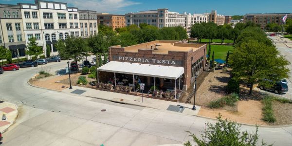 Areal view of exterior building of Pizzeria Testa in Frisco Square, TX 