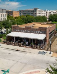 Areal view of exterior building of Pizzeria Testa in Frisco Square, TX