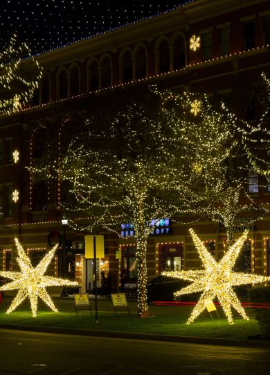 Downtown Frisco Square at night with Christmas lights and decorations